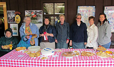 Winners and judges at the Annual Apple Pie Competition at the Apple Stir Fall Harvest Festival at MacQueen Apple Orchard, Cider Mill, Farm Market, and Pick Your Own Apples, Holland, Ohio, west of Toledo