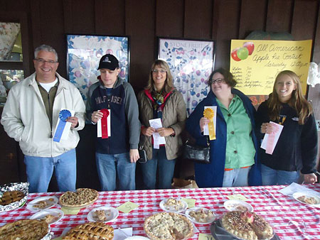 Winners and judges at the Annual Apple Pie Competition at the Apple Stir Fall Harvest Festival at MacQueen Apple Orchard, Cider Mill, Farm Market, and Pick Your Own Apples, Holland, Ohio, west of Toledo