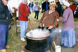 Stirring the apple butter is an ongoing activity for all at the Apple Stir Fall Harvest Festival at MacQueen Apple Orchard, Cider Mill, Farm Market, and Pick Your Own Apples, Holland, Ohio, west of Toledo